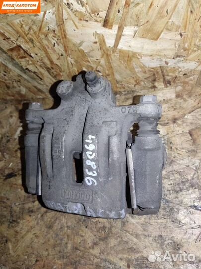 Суппорт тормозной задний правый Mazda CX-7 ER