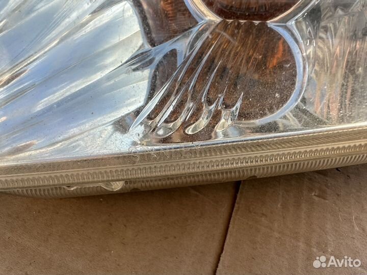 Фара левая Mitsubishi Lancer 9