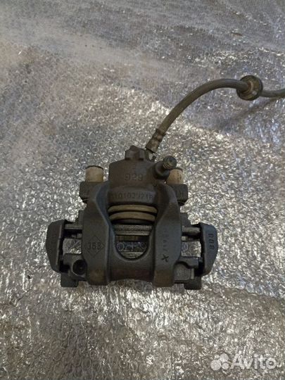 Суппорт тормозной передний левый Renault Logan L8