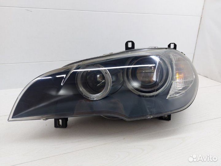 Фара галогеновая левая Bmw