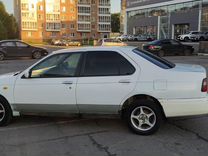 Nissan Bluebird 1.8 AT, 1997, 340 000 км, с пробегом, цена 135 000 руб.