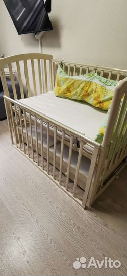 Детская кроватка с поперечным маятником