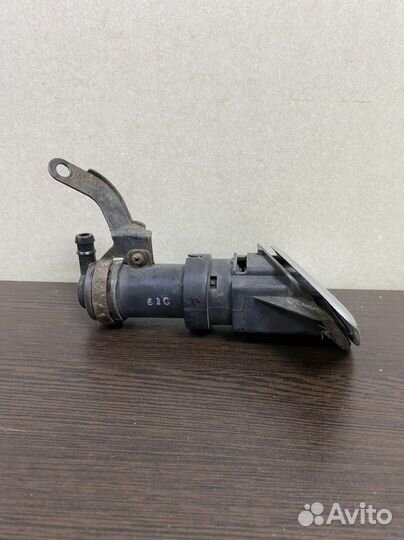 Форсунка омывателя фар правая на Honda Civic 5D