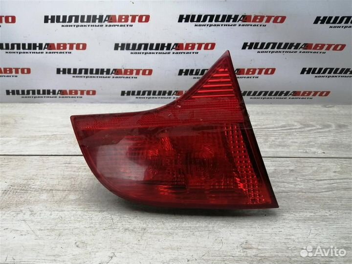 Фонарь левый в крышку багажника Ауди А4 Б7