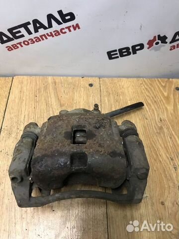 Суппорт передний левый Kio Rio