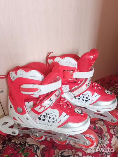 Роликовые коньки