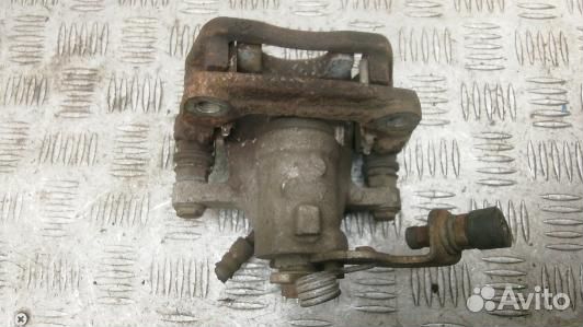 Суппорт тормозной задний правый KIA CEE'D 2 (JD)