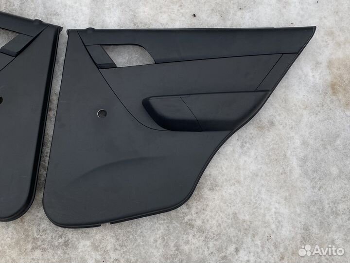 Обшивки задних дверей Шевроле Авео Т250
