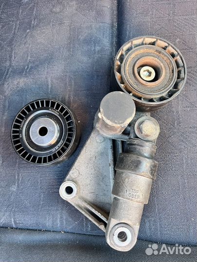 Натяжной ролик