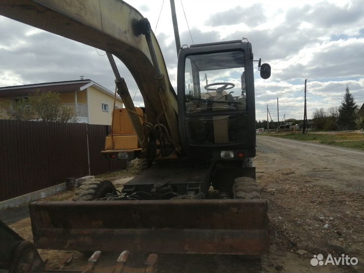 Колёсный экскаватор Твэкс ЕК-12-10, 2003