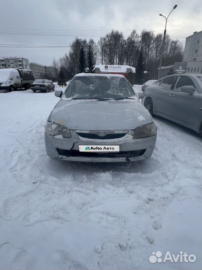 Mazda Familia 1.5 AT, 1999, 100 000 км