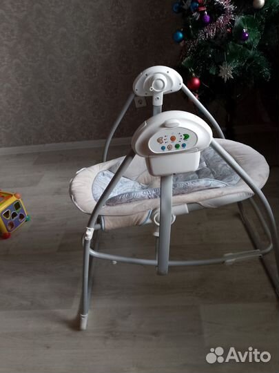 Электрическая качель для новорожденных
