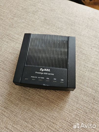 Модем adsl2+ zuxel