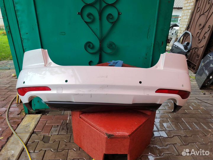 Бампер задний Mazda CX-7 рестайлинг