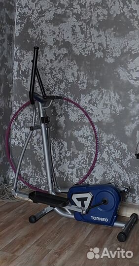 Эллиптический тренажер torneo