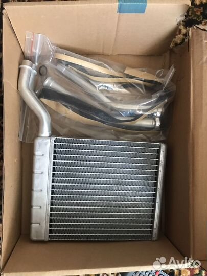 Радиатор печки Мазда 3