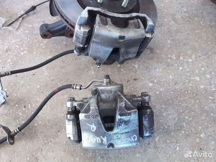 Суппорта передние Киа Спортейдж 4