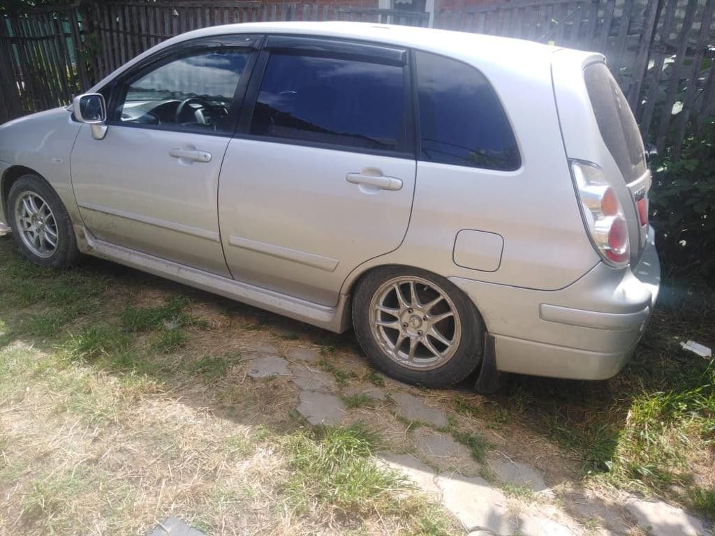 Suzuki Liana: фото владельца