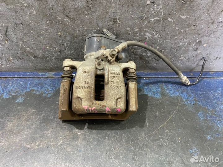 Суппорт задний левый Volkswagen Tiguan NF