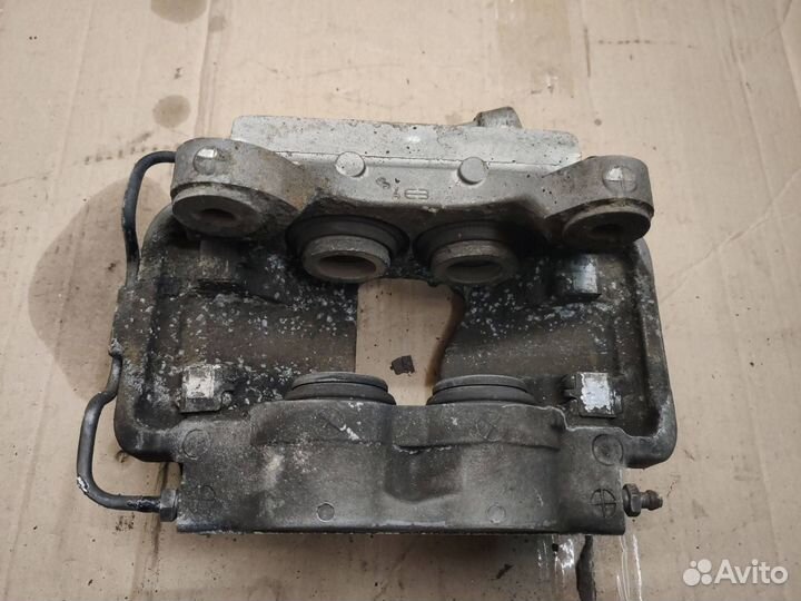 Суппорт тормозной передний левый BMW 7 G11/G12