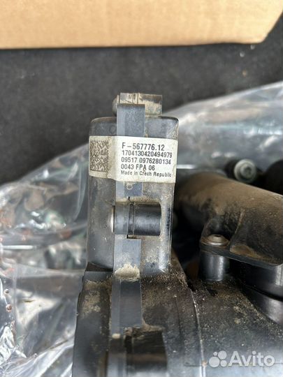 06L121111H Термостат с помпой