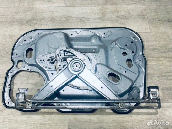 Стеклоподъемник передний левый Ford Focus седан