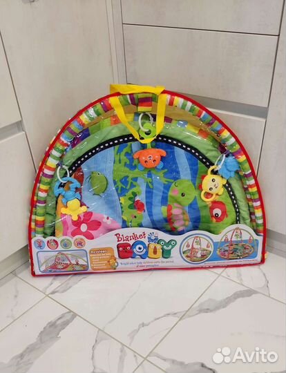 Развивающий коврик новый