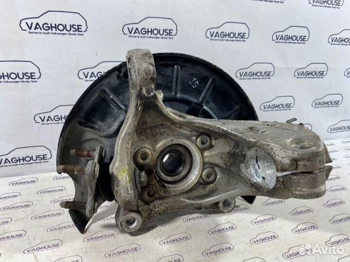 Кулак поворотный передний левый Volkswagen Passat