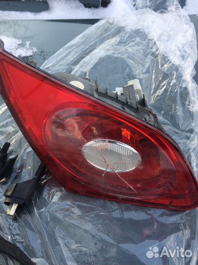 Фонарь левый крышки багажника Volkswagen Passat CC