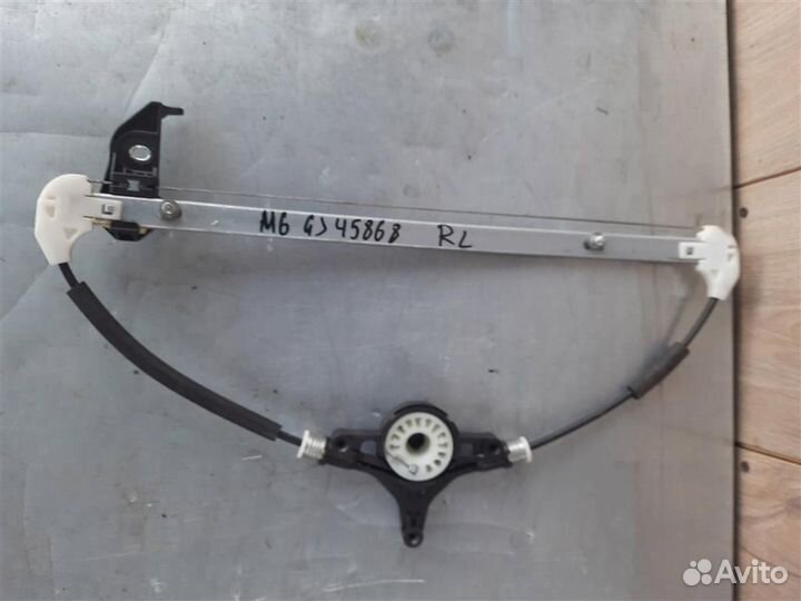 Стеклоподъемник электр. задний левый от Mazda Maz