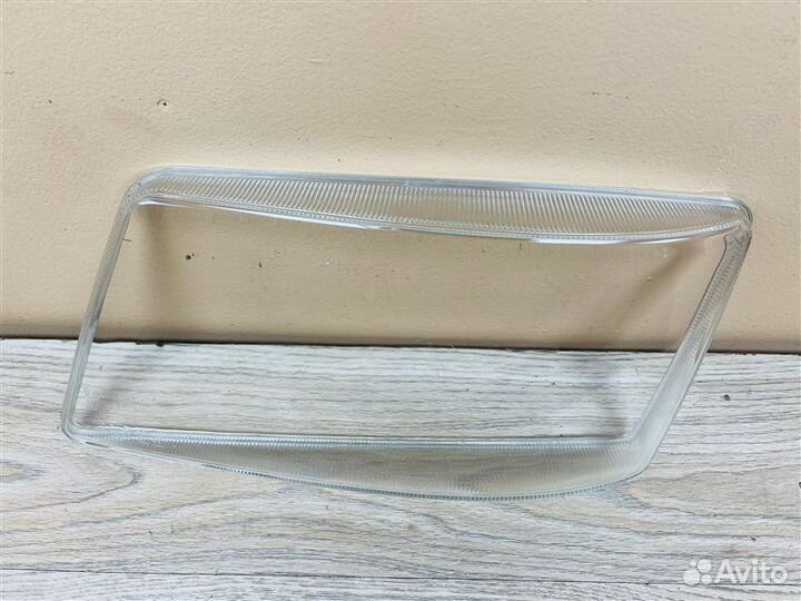 Стекло фары переднее левое Man