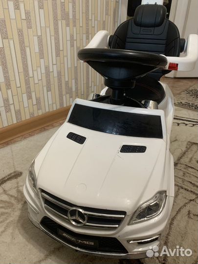 Детская машинка каталка с ручкой