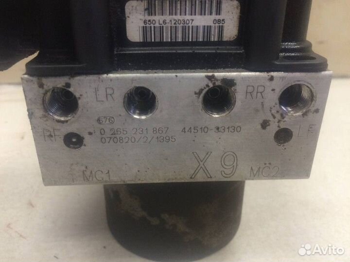 Блок ABS (насос) Toyota Camry