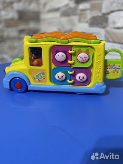 Игрушка музыкальный автобус