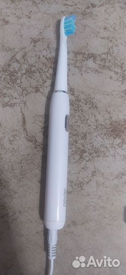 Электронная зубная щетка