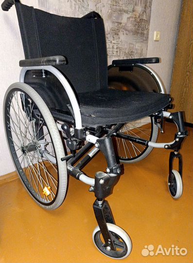 Инвалидная коляска