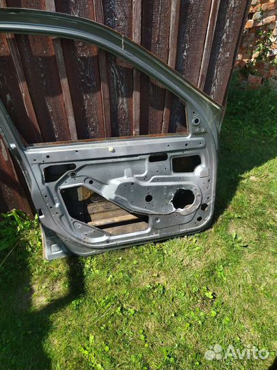 Дверь калина передняя левая