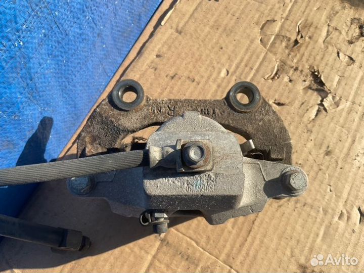 Суппорт задний правый Chevrolet Trailblazer GMT360