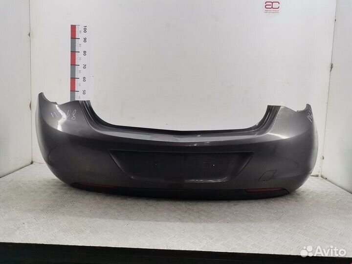 Бампер задний для Opel Astra J 13264420
