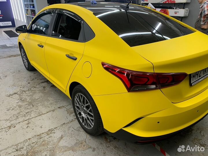 Оклейка автомобиля под такси