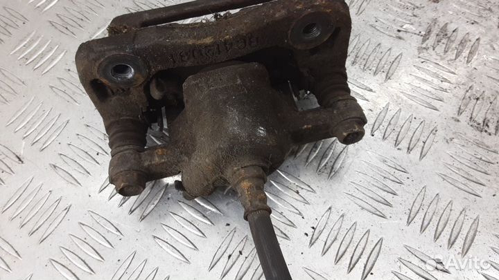 Суппорт задний правый Kia Magentis рест. 2004