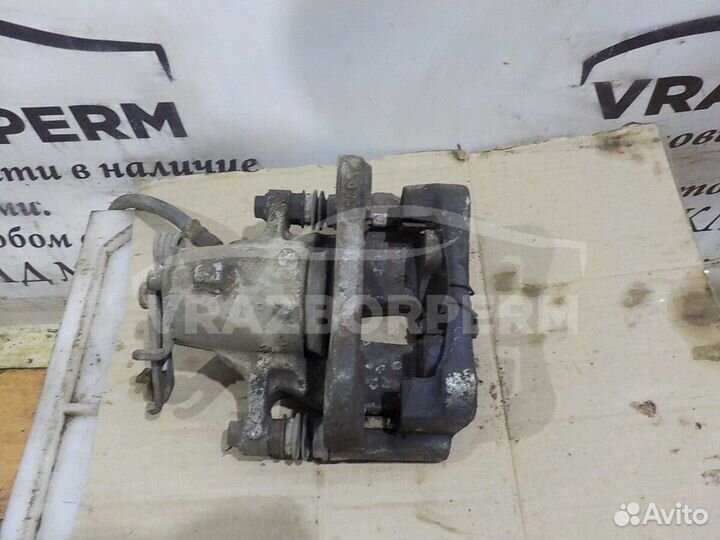 Суппорт тормозной задний правый Opel Insignia