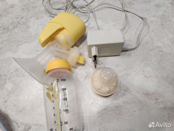 Молокоотсос электрич. Medela+соска Calma/medela