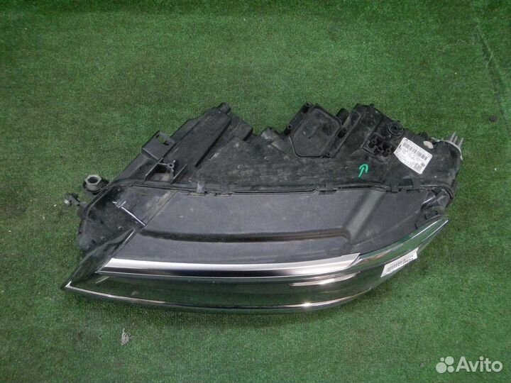Фара левая Volkswagen Tiguan