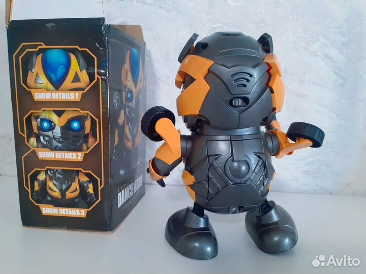 Танцующий робот трансформер