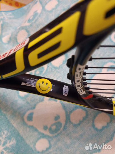 Теннисная ракетка и сумка