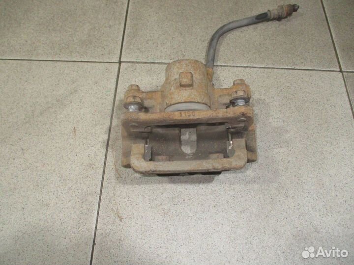 Суппорт задний левый Toyota Corolla (E120) 2000-2