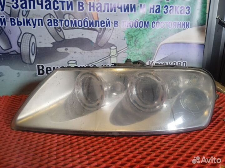 Фара передняя левая Volkswagen Touareg