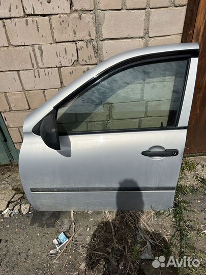 Стекло водительской двери калина гранта