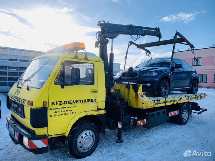 Эвакуатор с манипулятором по всей области